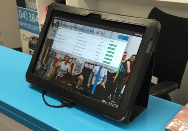 An early version of Influx running on a tablet at a gym front desk in 2016, showing that day's class timetable