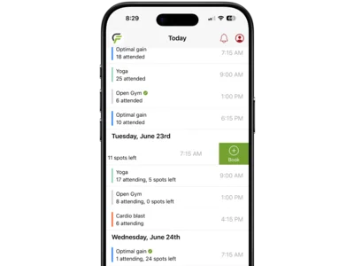 Member app class timetable showing spots left and a book button